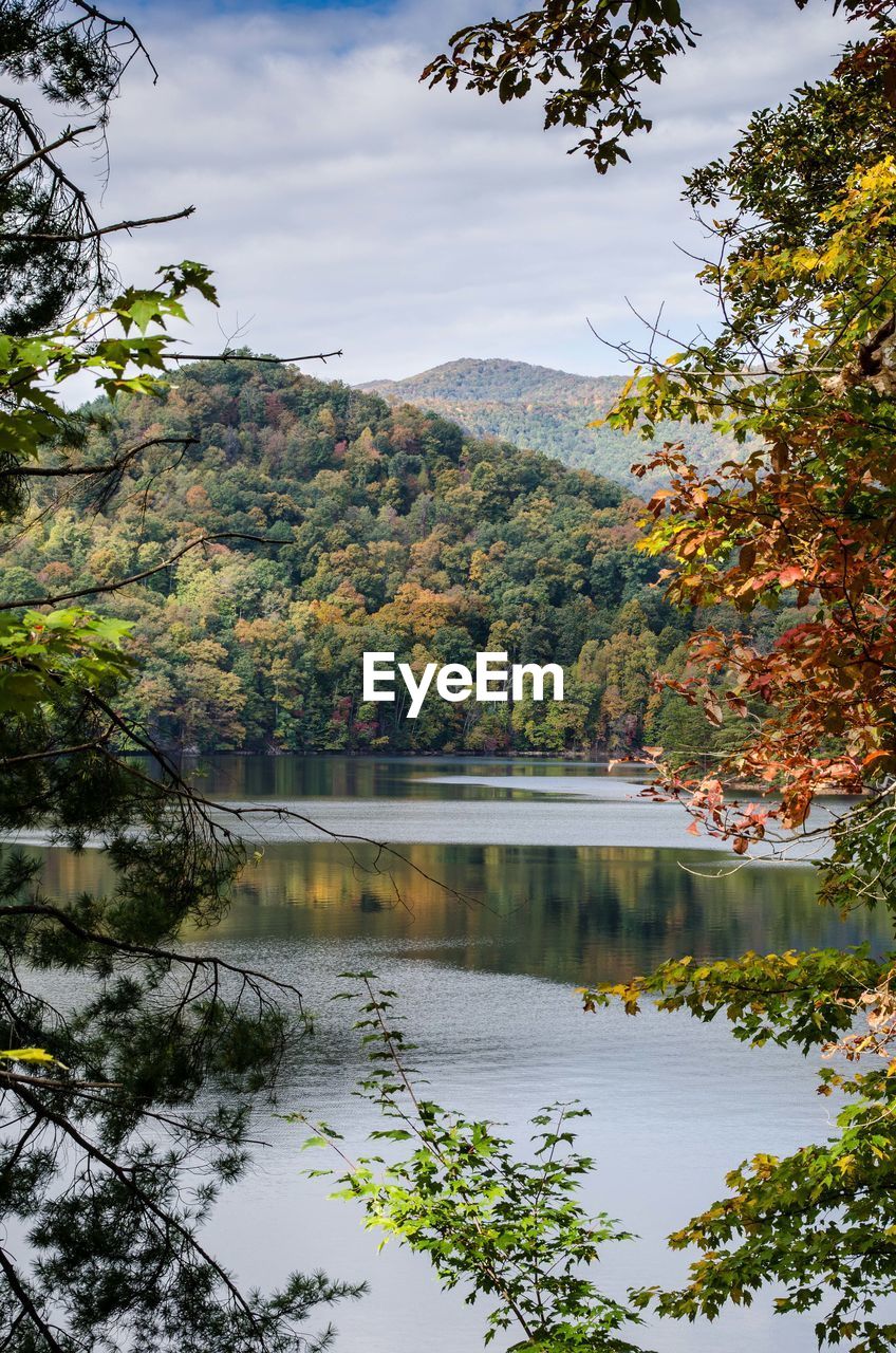 SCENIC VIEW OF LAKE AND MOUNTAINS