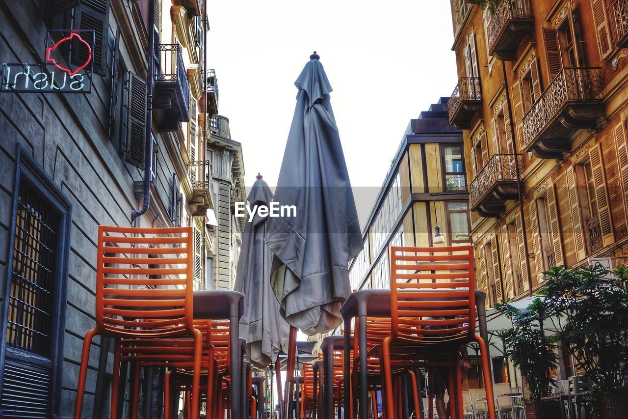 Low angle view of buildings in city against sky