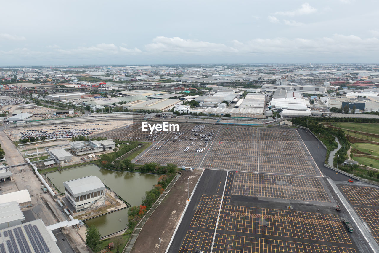 high angle view of buildings in city against sky