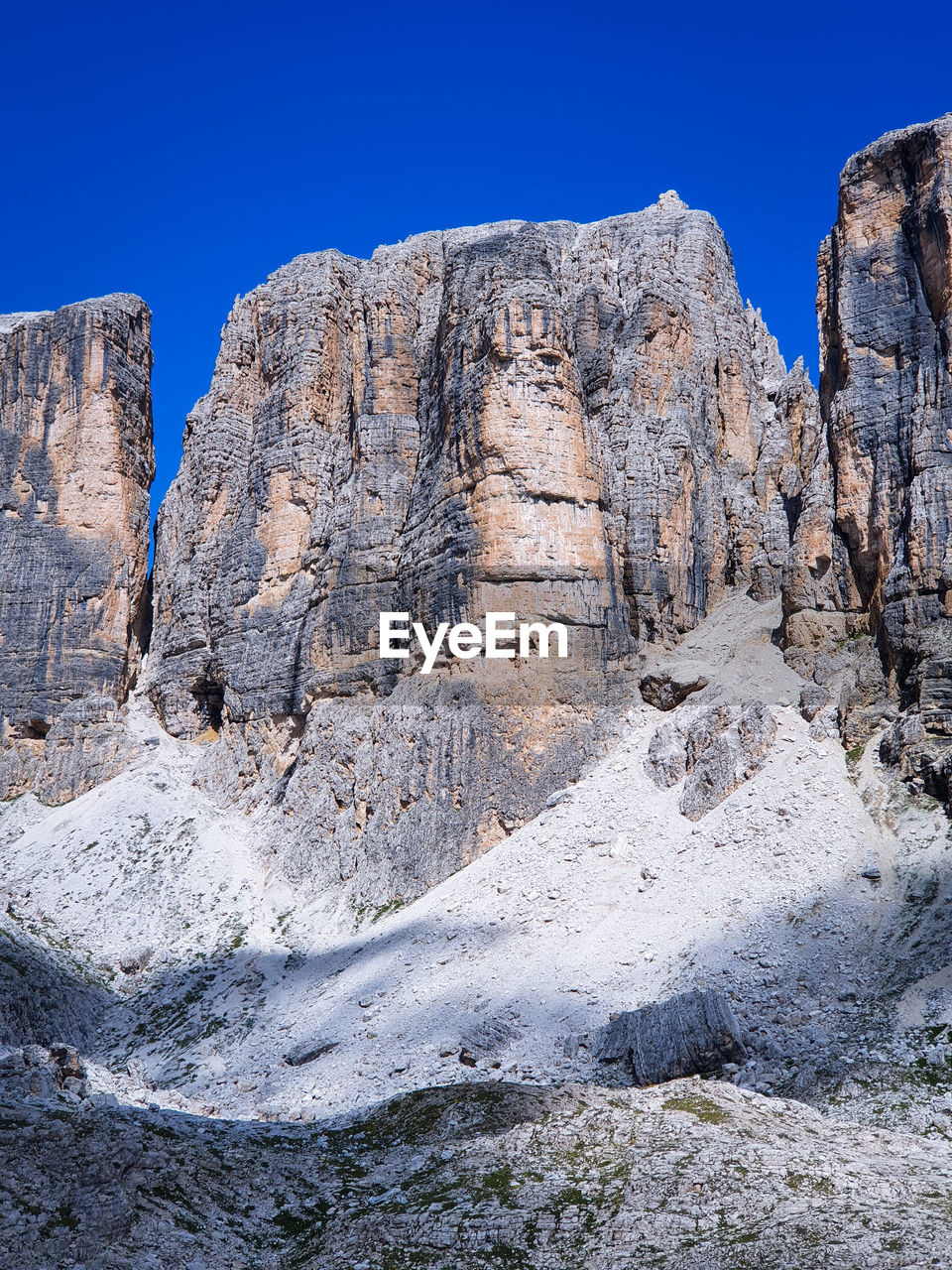 Low angle view of rock formation against sky