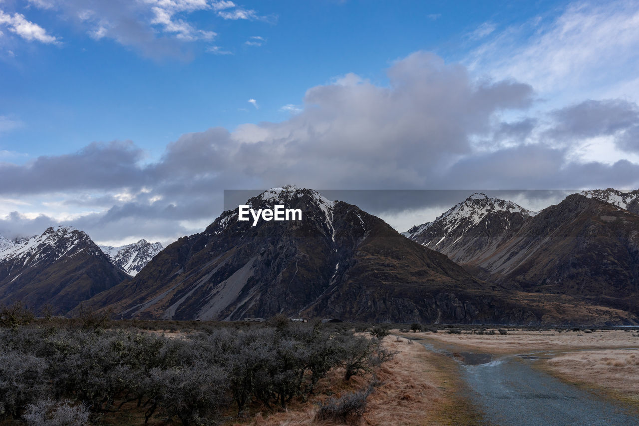 Scenic view along the mount cook road alongside with snow capped southern alps and majestic mt cook.