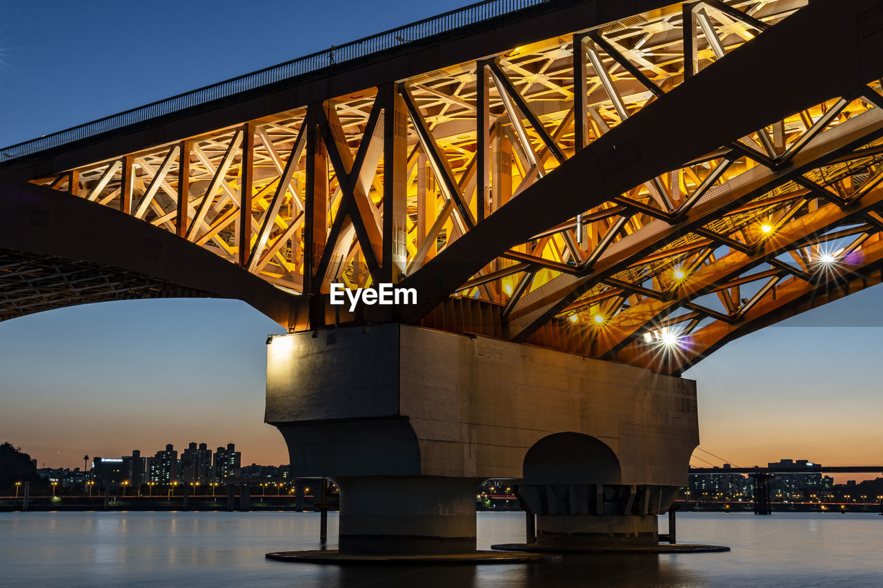 Low angle view of bridge over river