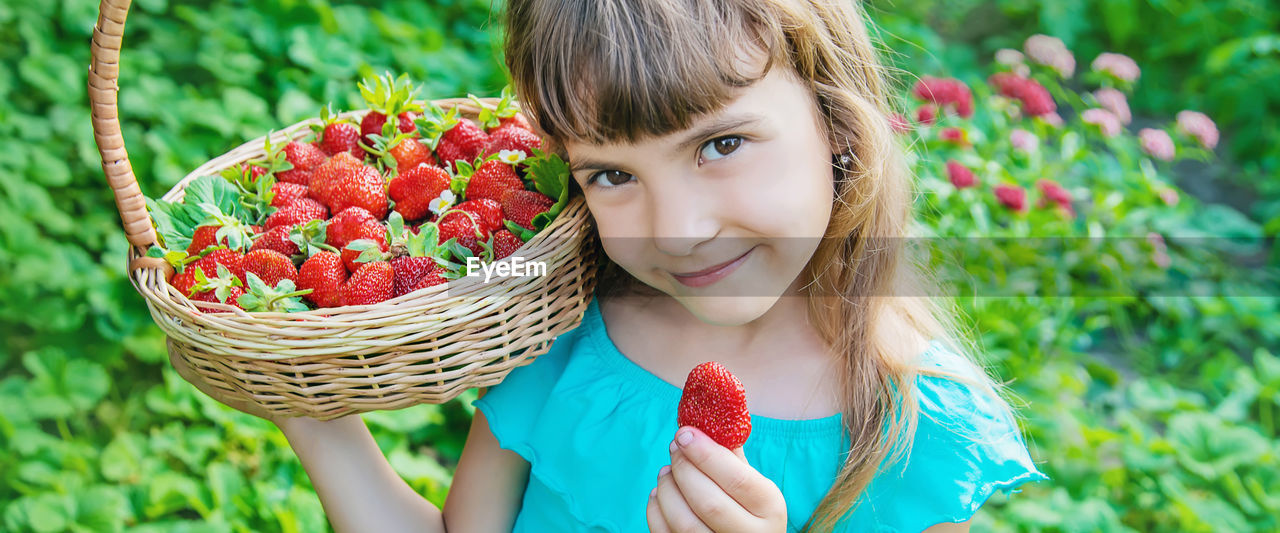 Portrait of smiling young woman in basket