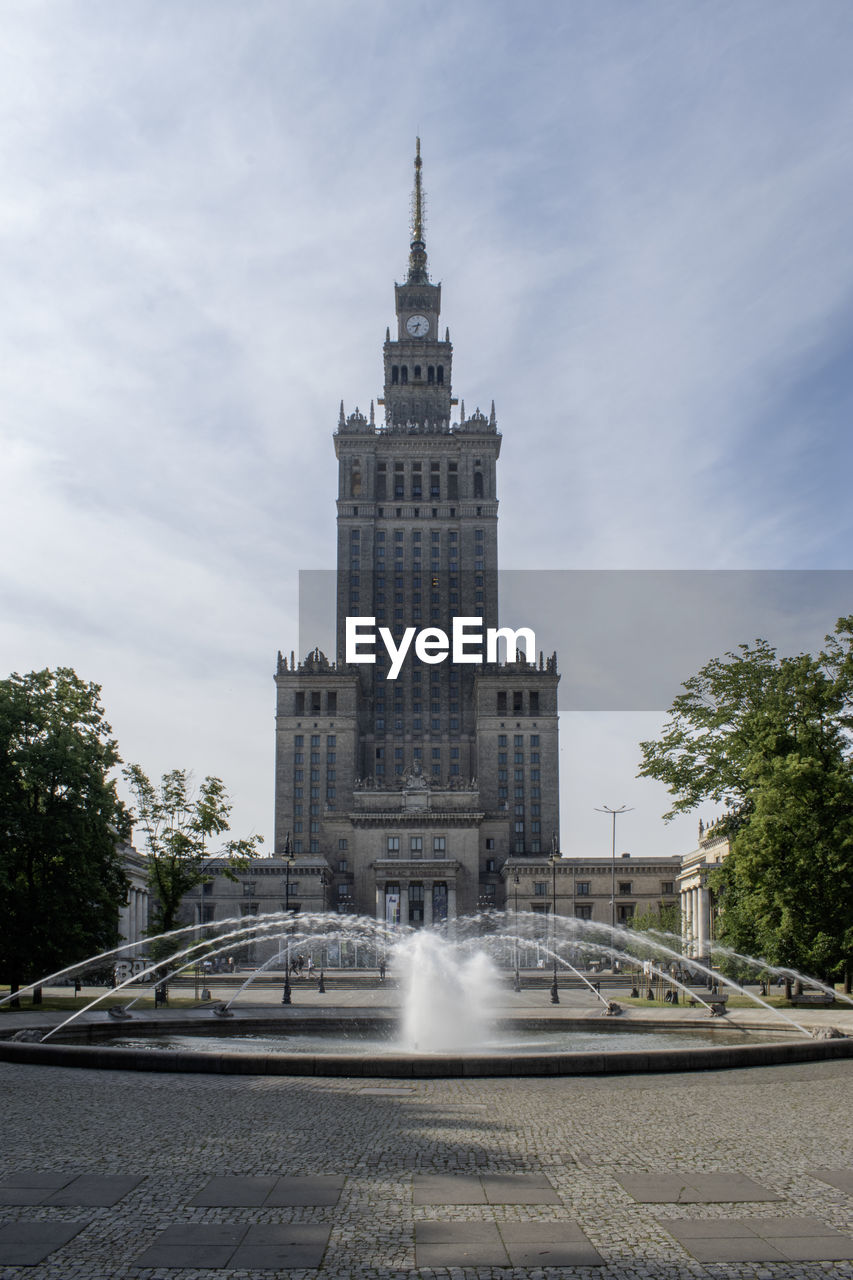 low angle view of fountain in city