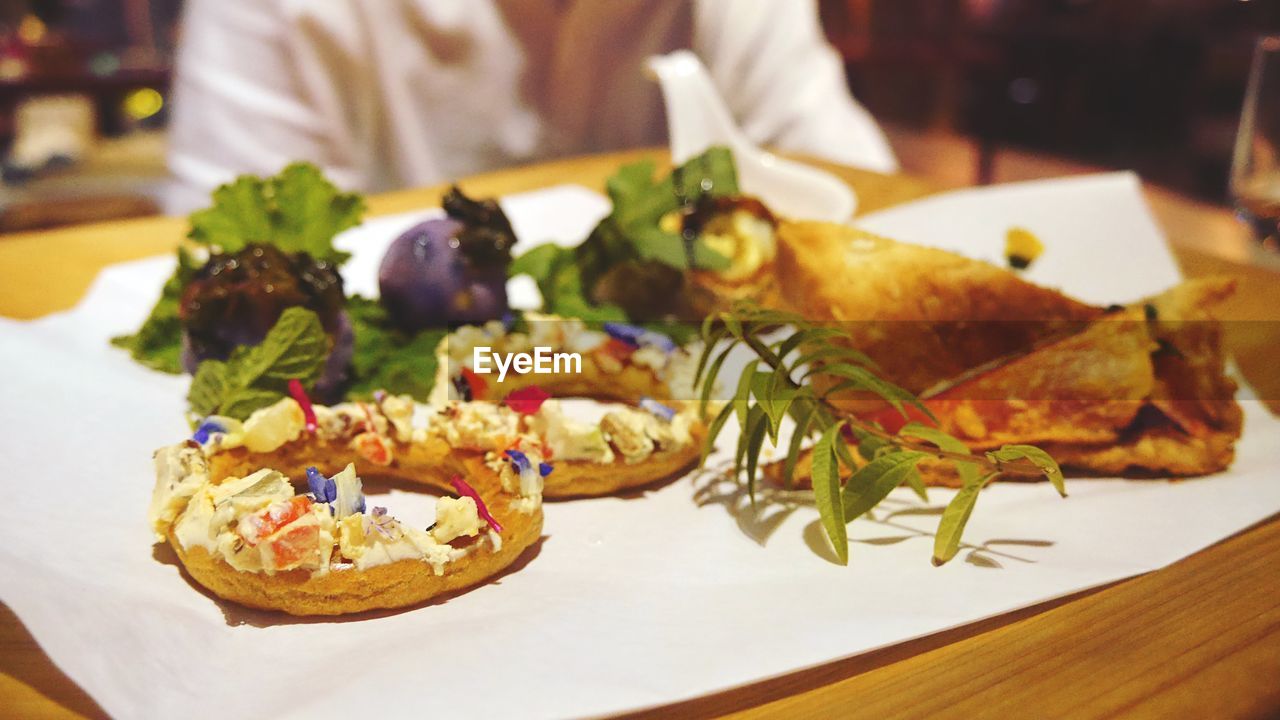 CLOSE-UP OF SUSHI SERVED IN PLATE