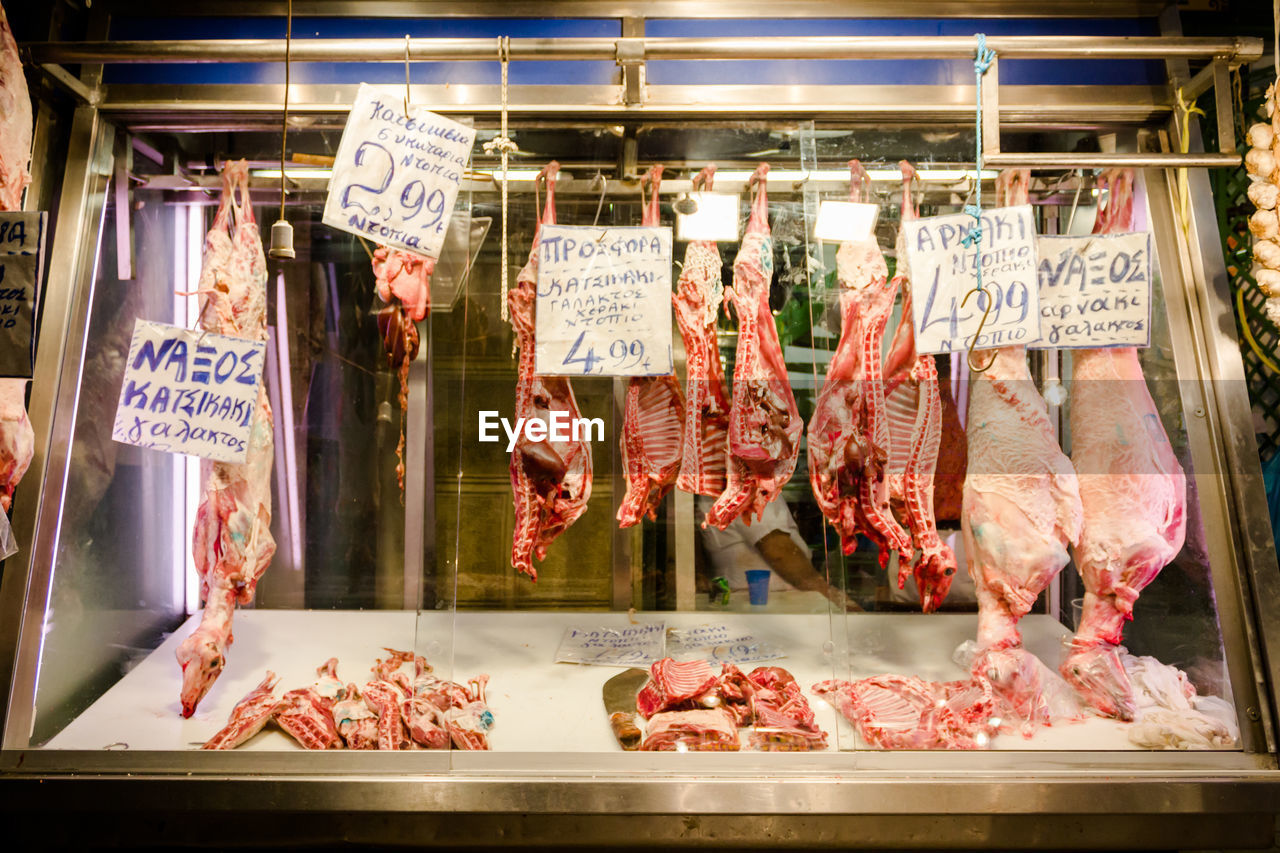 Meat hanging in butcher shop