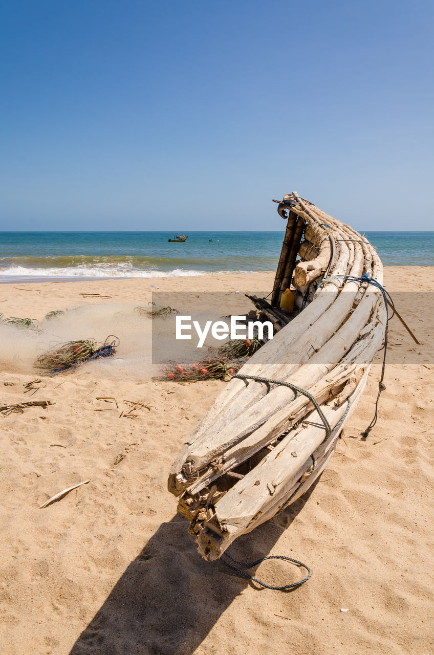 Scenic view of beach against clear sky