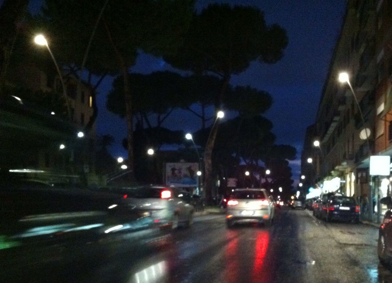 TRAFFIC ON ROAD AT NIGHT