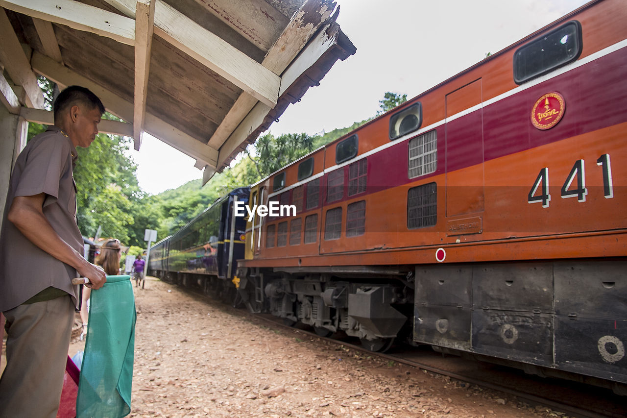 TRAIN AT RAILROAD STATION