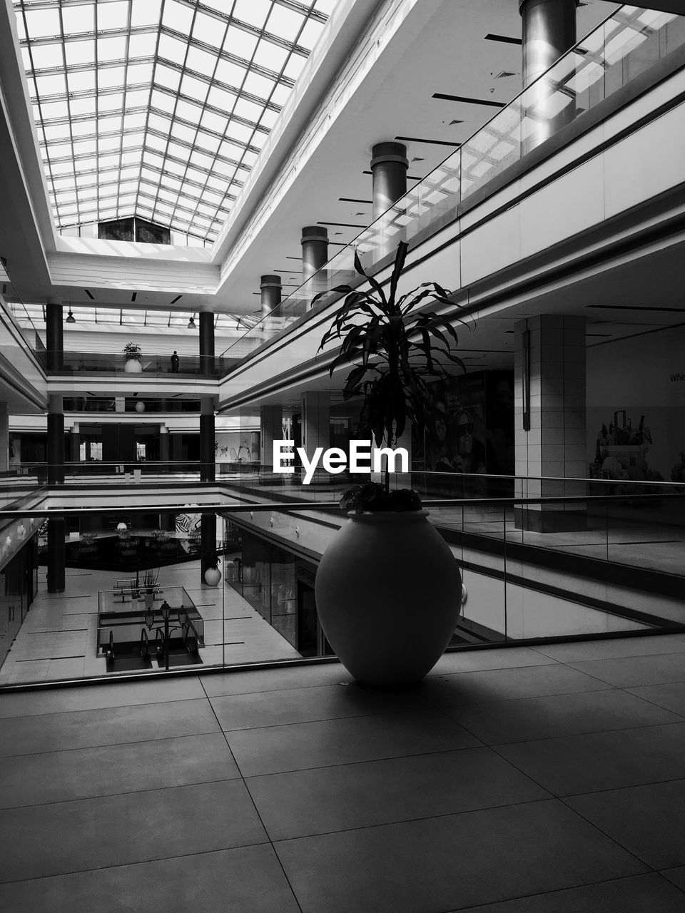 View of mall interior in black and white