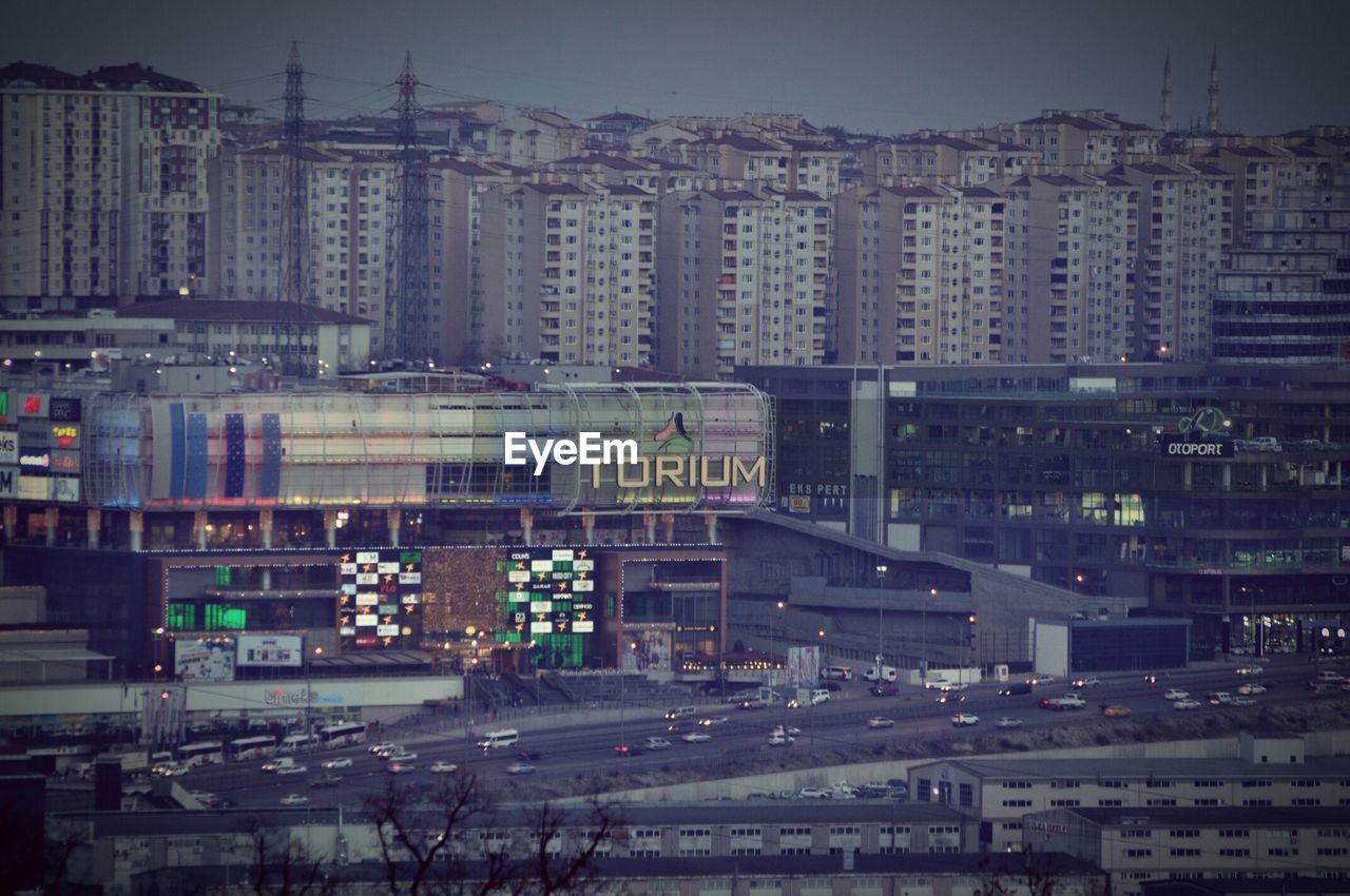 VIEW OF ILLUMINATED CITYSCAPE