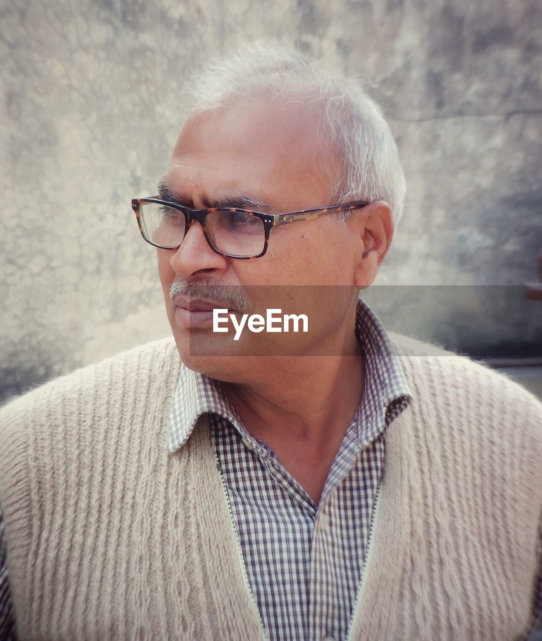 Close-up of man wearing eyeglasses