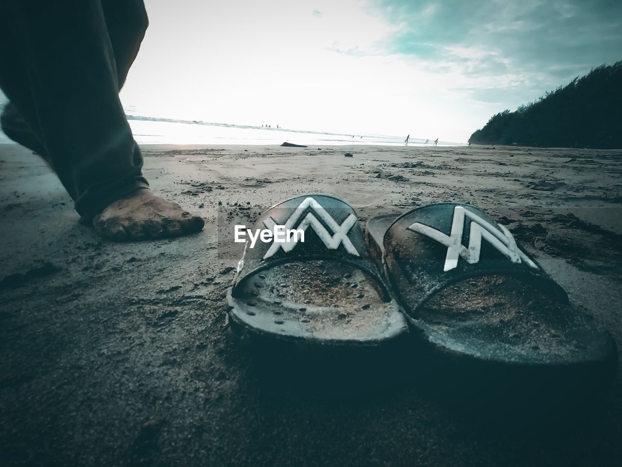 LOW SECTION OF MAN ON BEACH