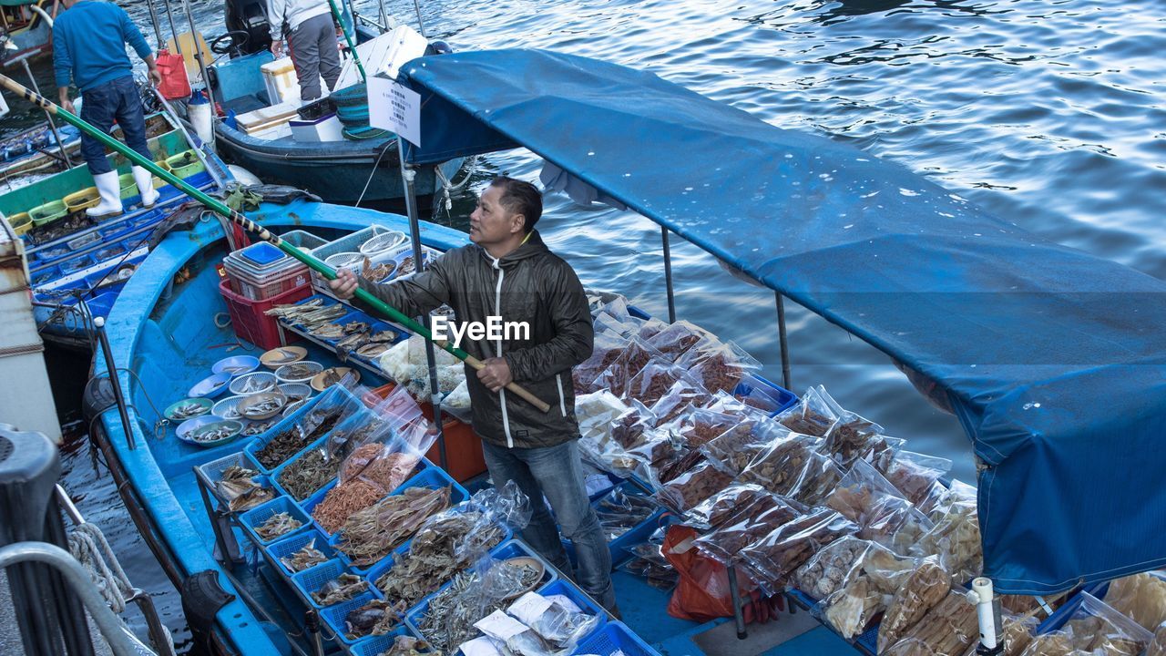 PEOPLE IN BOAT