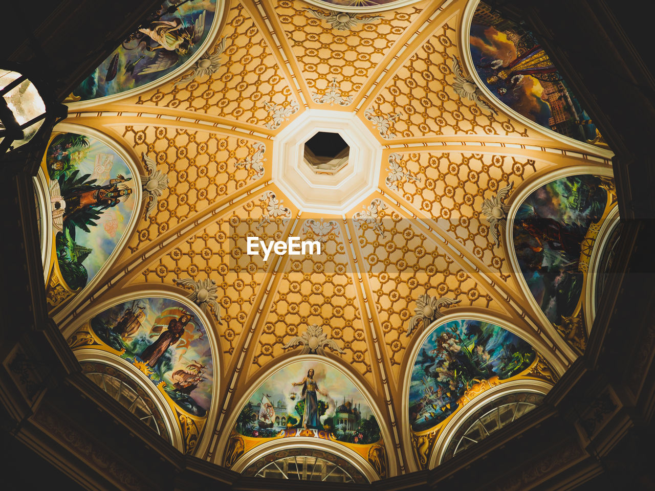 Low angle view of ornate ceiling in building