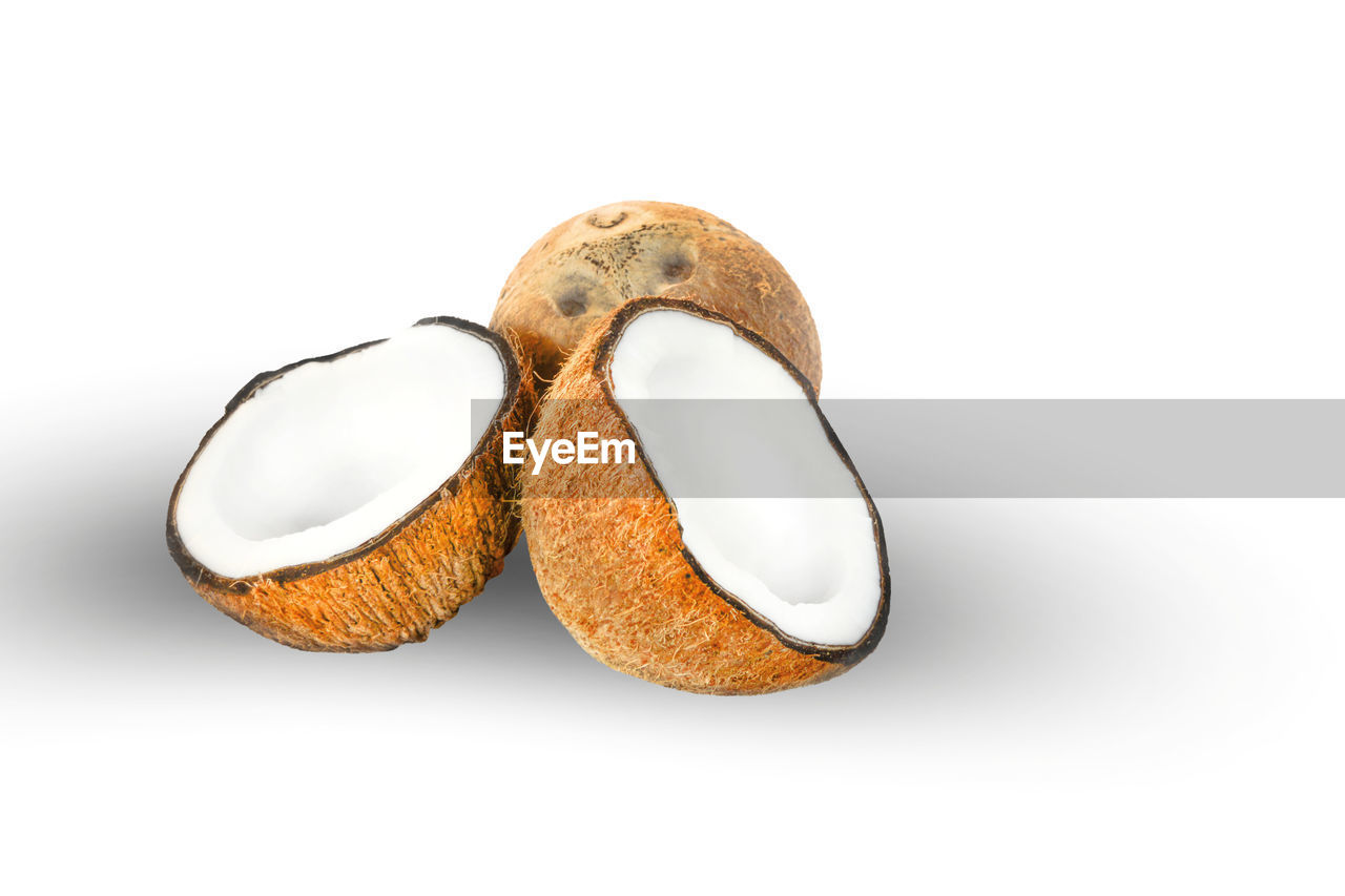 Close-up of coconut against white background