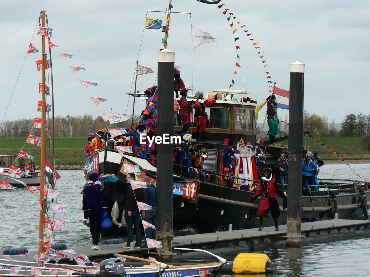 BOATS MOORED IN HARBOR