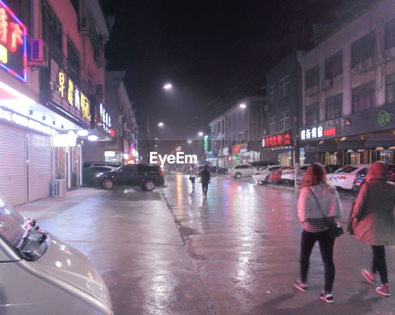 TRAFFIC ON STREET AT NIGHT