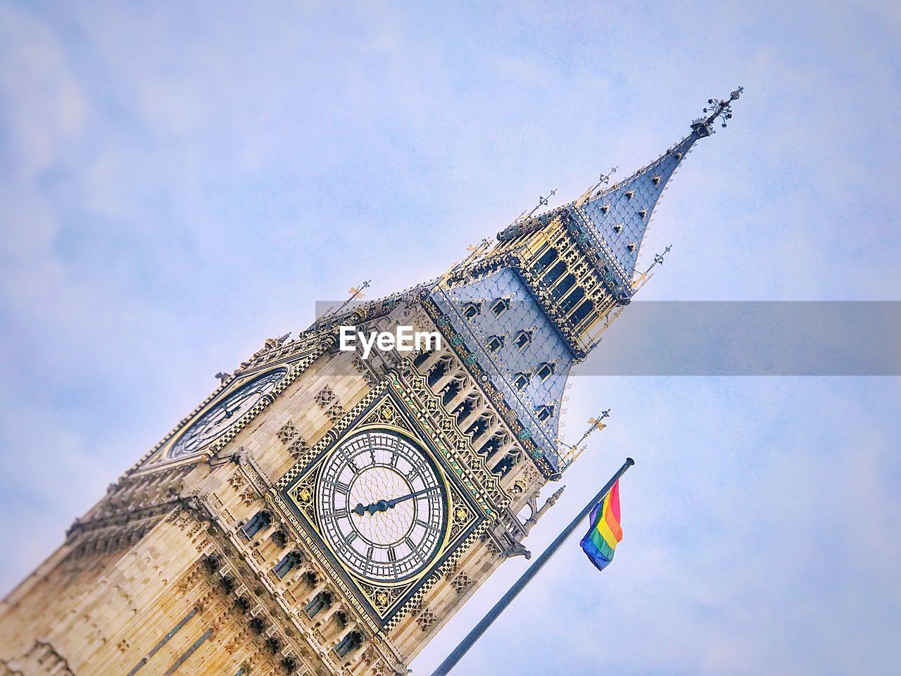 Low angle view of clock tower against sky