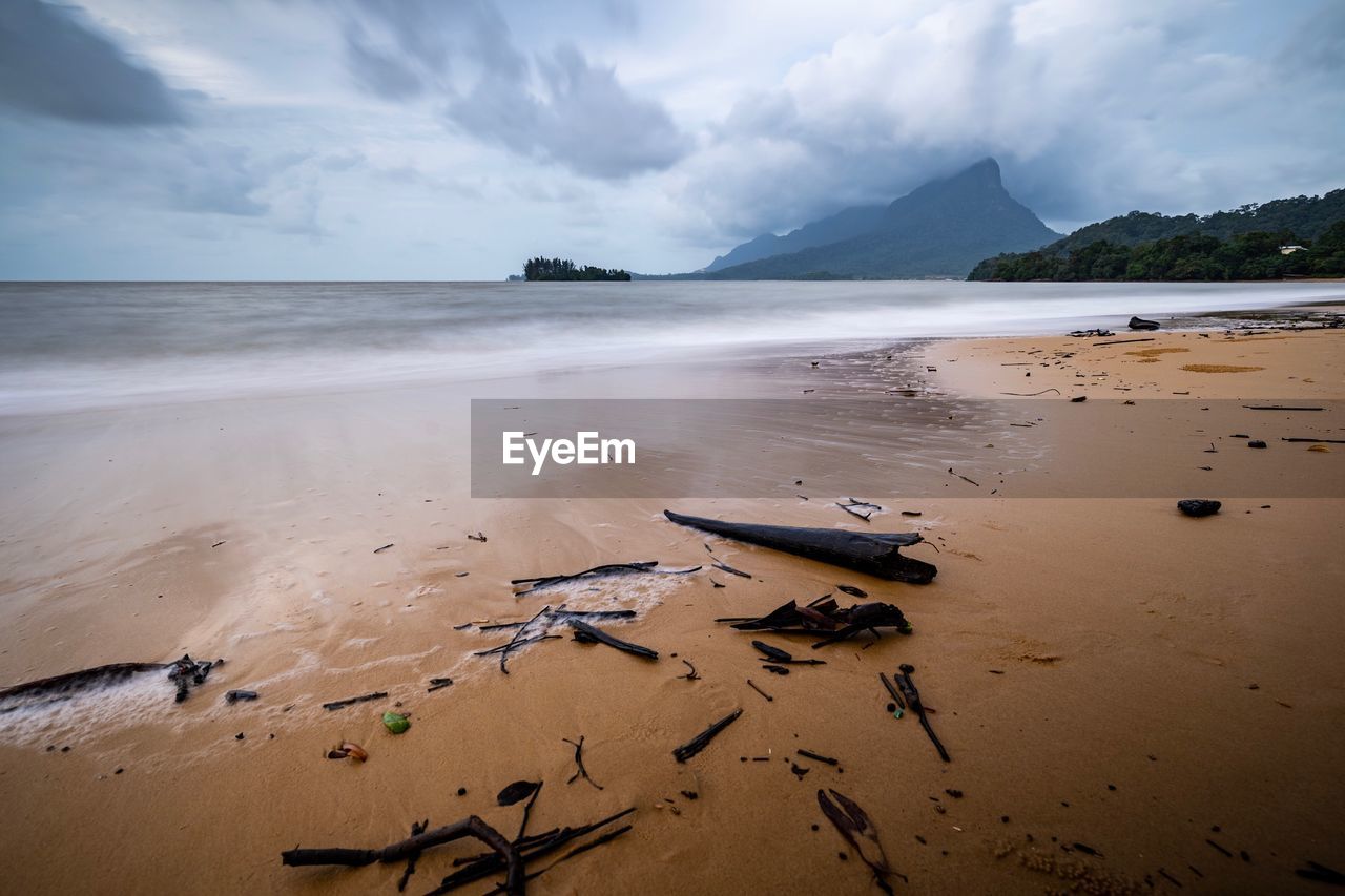 Scenic view of beach against sky