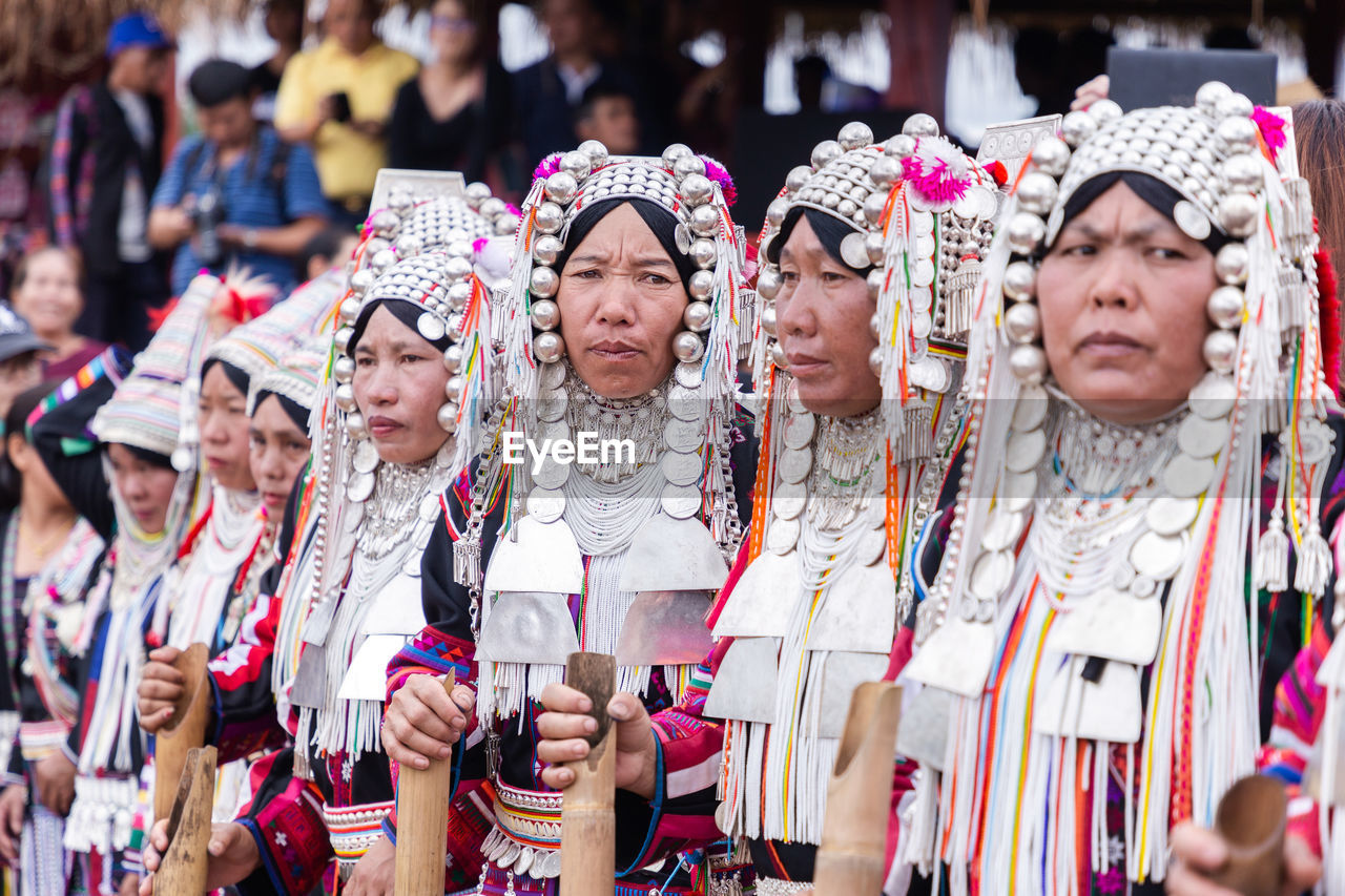 GROUP OF PEOPLE IN TRADITIONAL CLOTHING