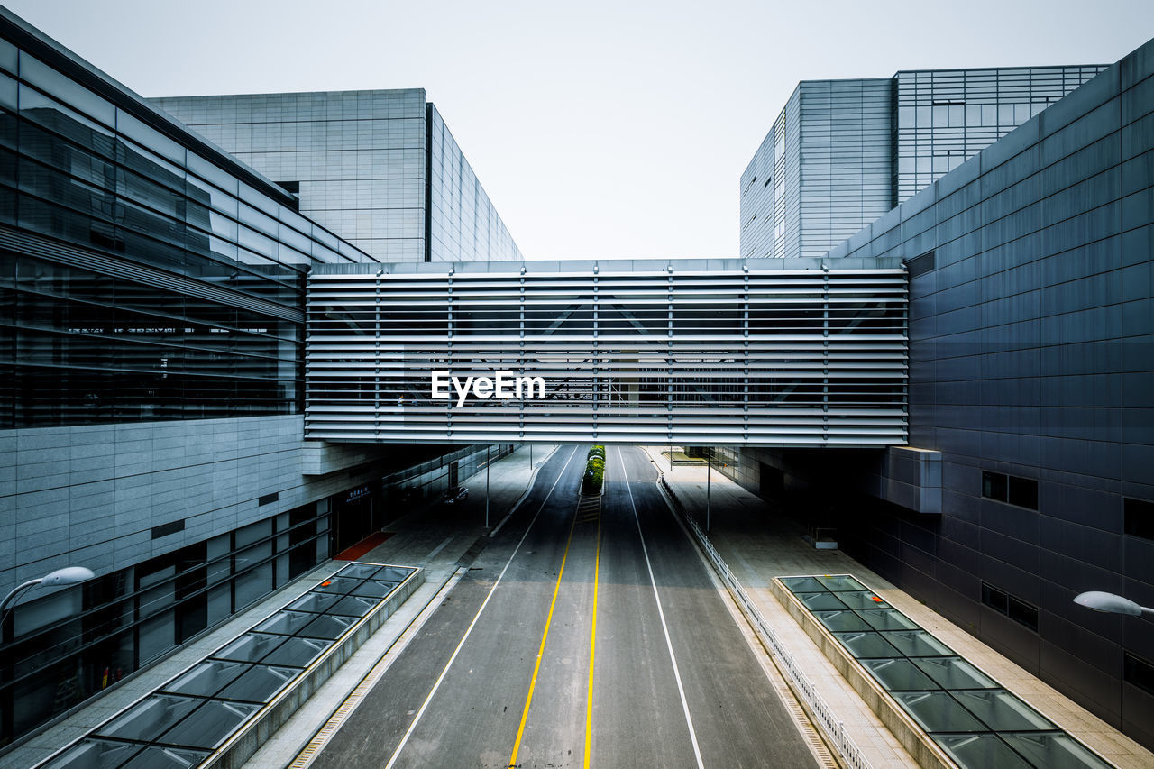 High angle view of road amidst modern buildings