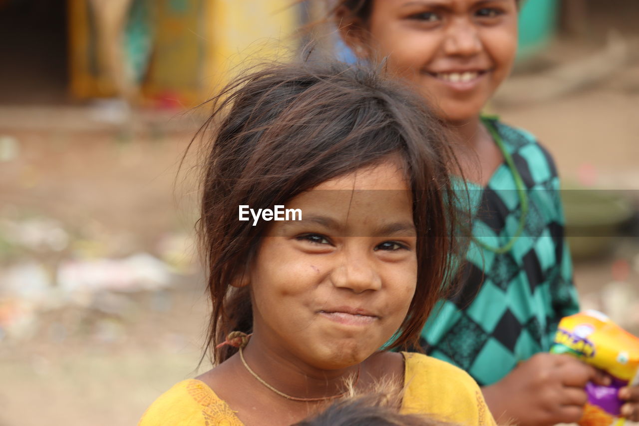 PORTRAIT OF A SMILING GIRL