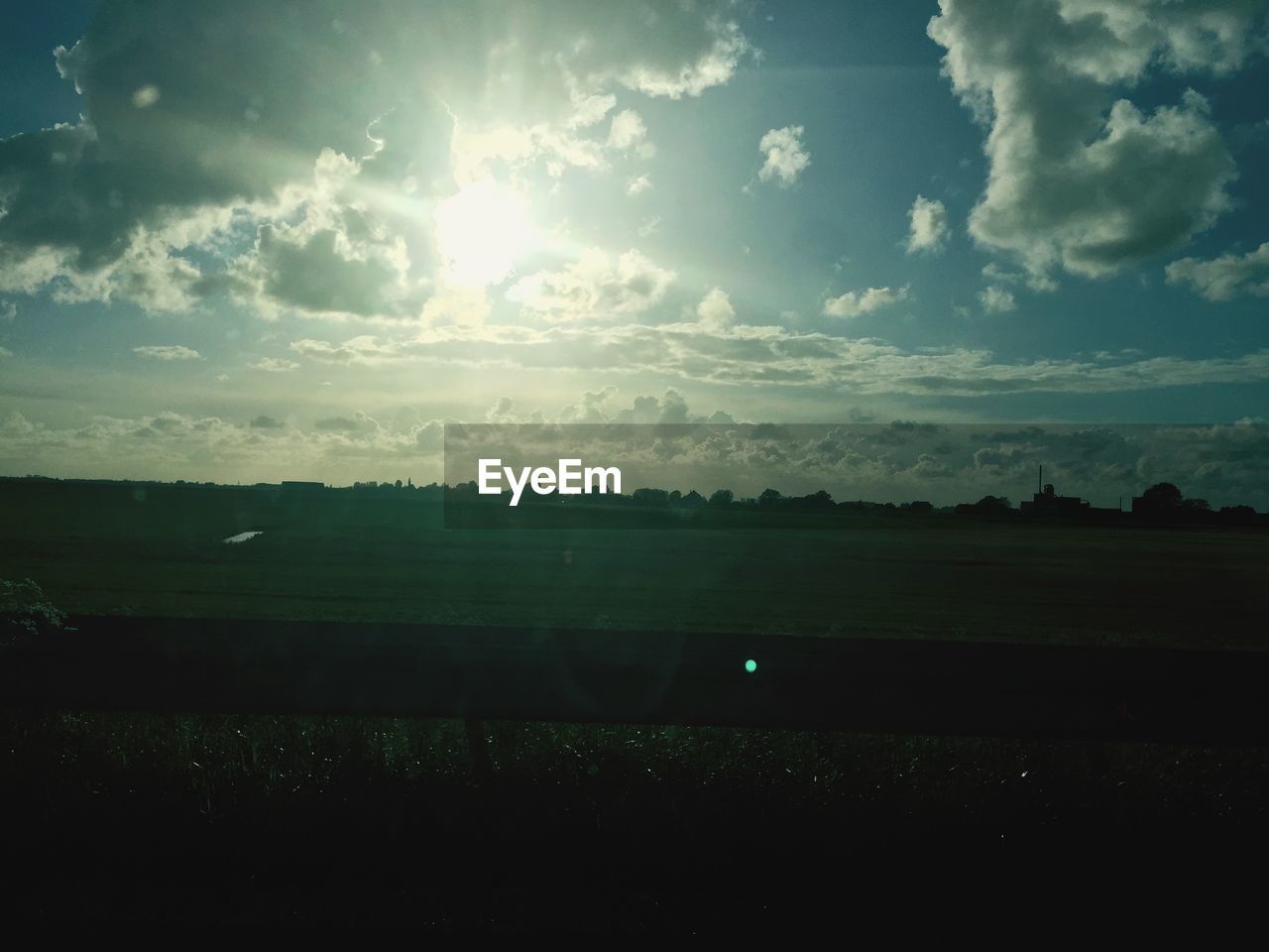 SCENIC VIEW OF LANDSCAPE AGAINST CLOUDY SKY