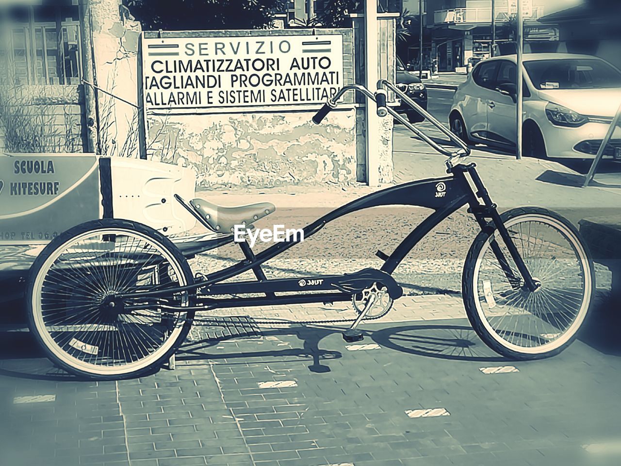 BICYCLE PARKED ON CITY STREET