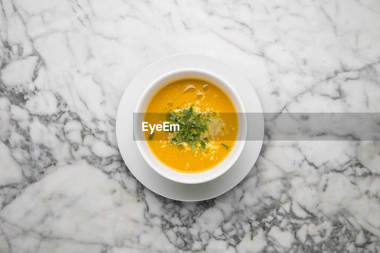 Directly above shot of soup in bowl on table