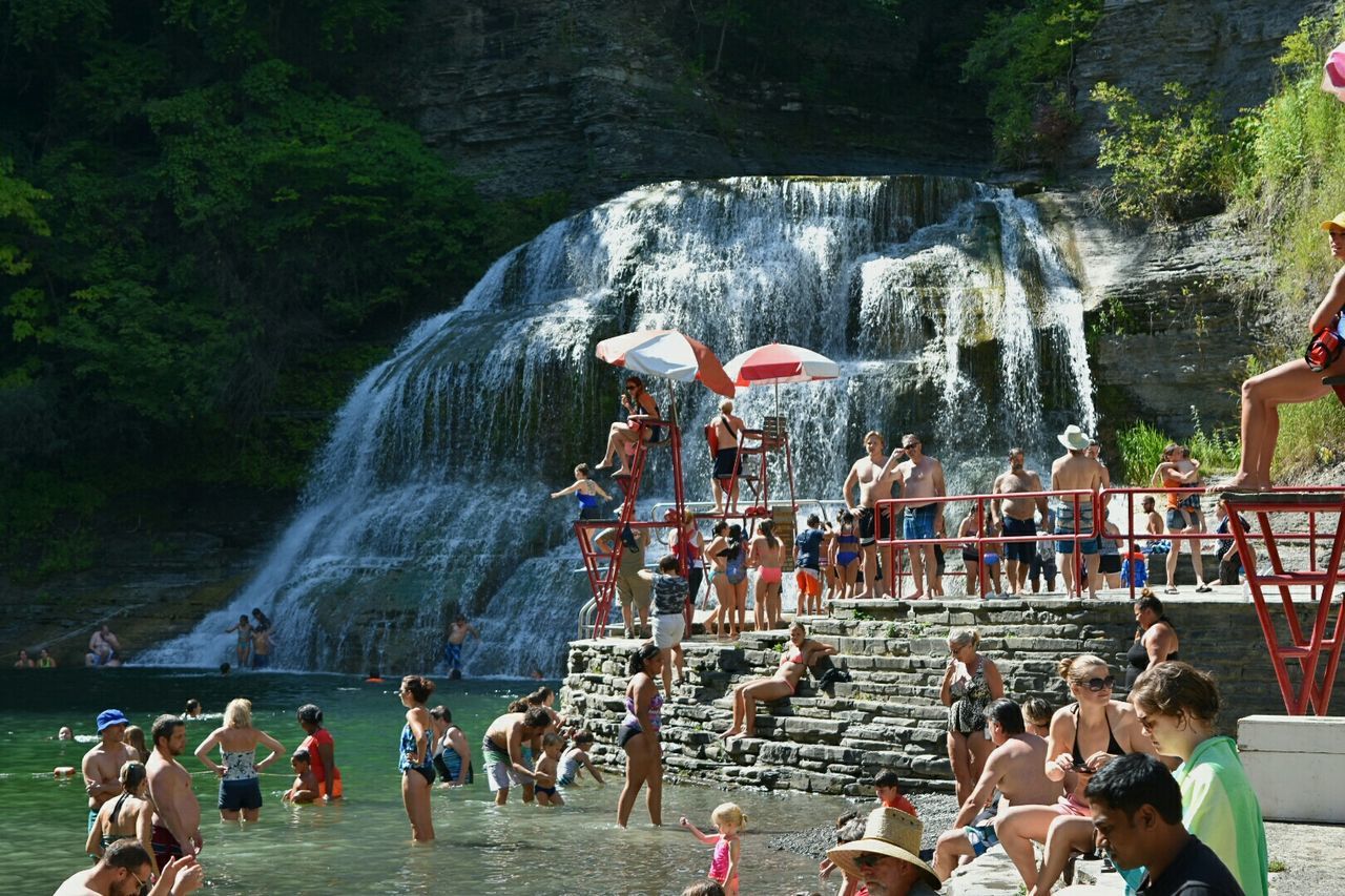 TOURISTS ENJOYING IN WATER