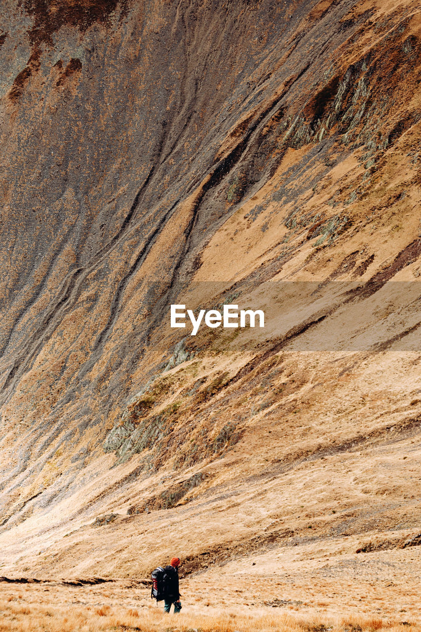Friend trekking on a mountain path