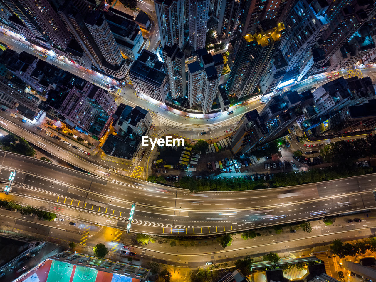 high angle view of illuminated city street at night