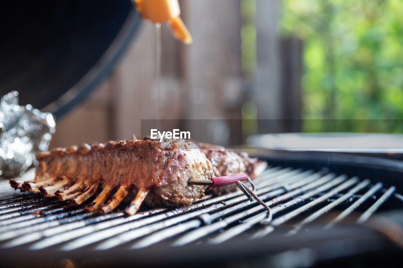 Close-up of meat on barbecue grill