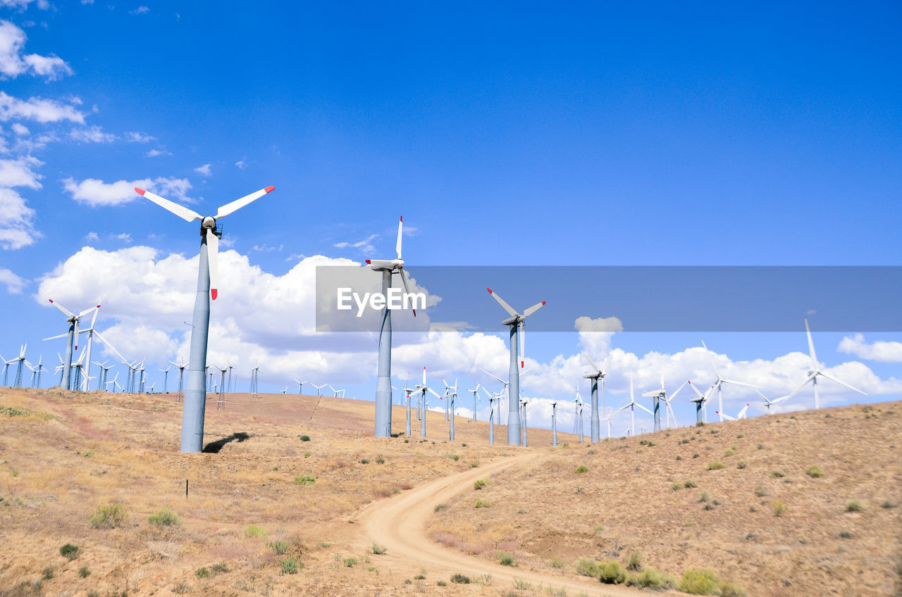 WIND TURBINES ON LANDSCAPE WITH WIND TURBINES