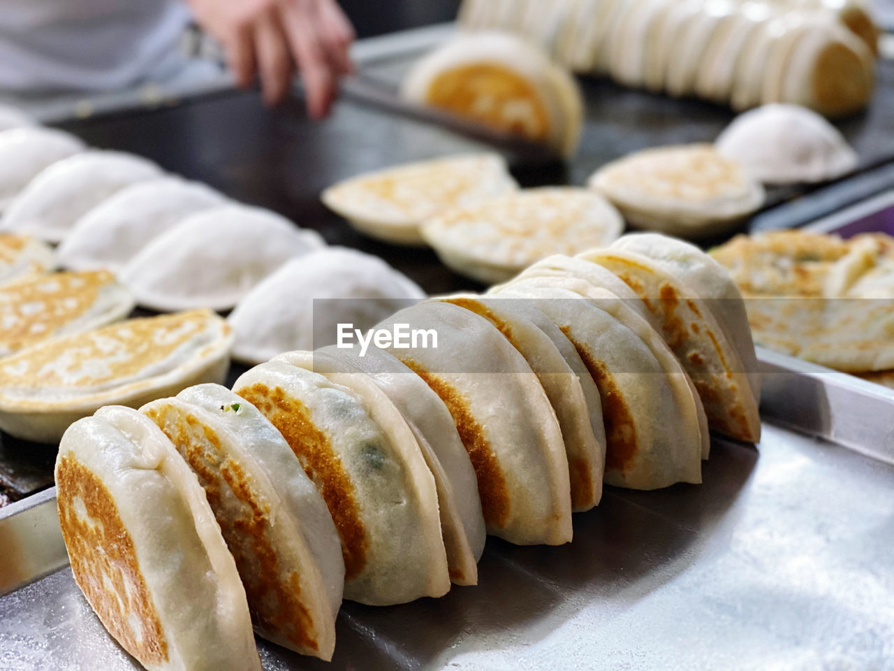 Close-up of preparing food on hot plate