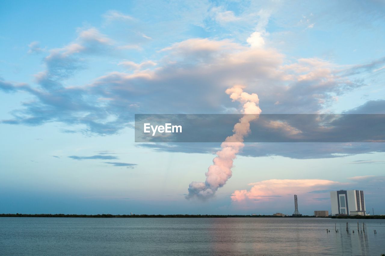 Vapor trail at cape canaveral against sky