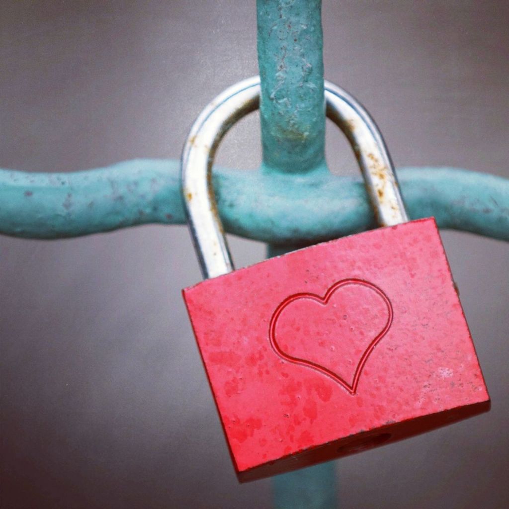 CLOSE-UP OF LOVE PADLOCKS