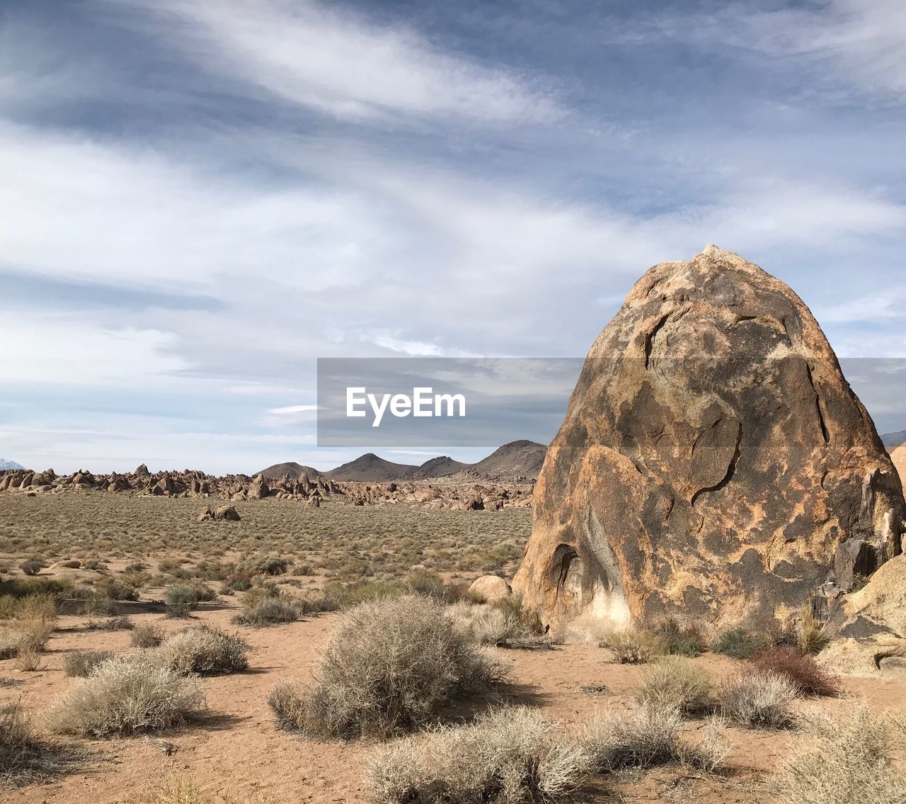 Rock formations on landscape against sky