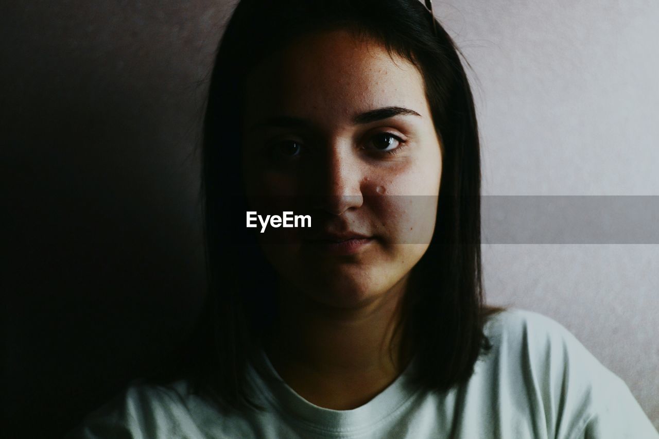 Close-up portrait of young woman