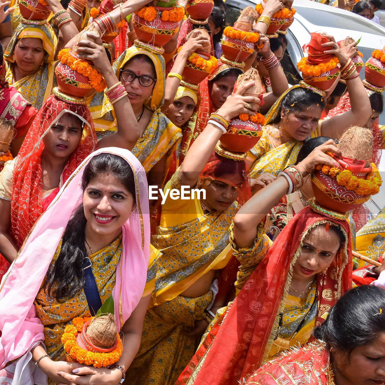 group of people, adult, celebration, women, tradition, event, traditional clothing, happiness, clothing, crowd, young adult, smiling, togetherness, religion, large group of people, carnival, men, emotion, lifestyles, multi colored, day, outdoors, traditional festival, high angle view, sari, enjoyment, festival, looking
