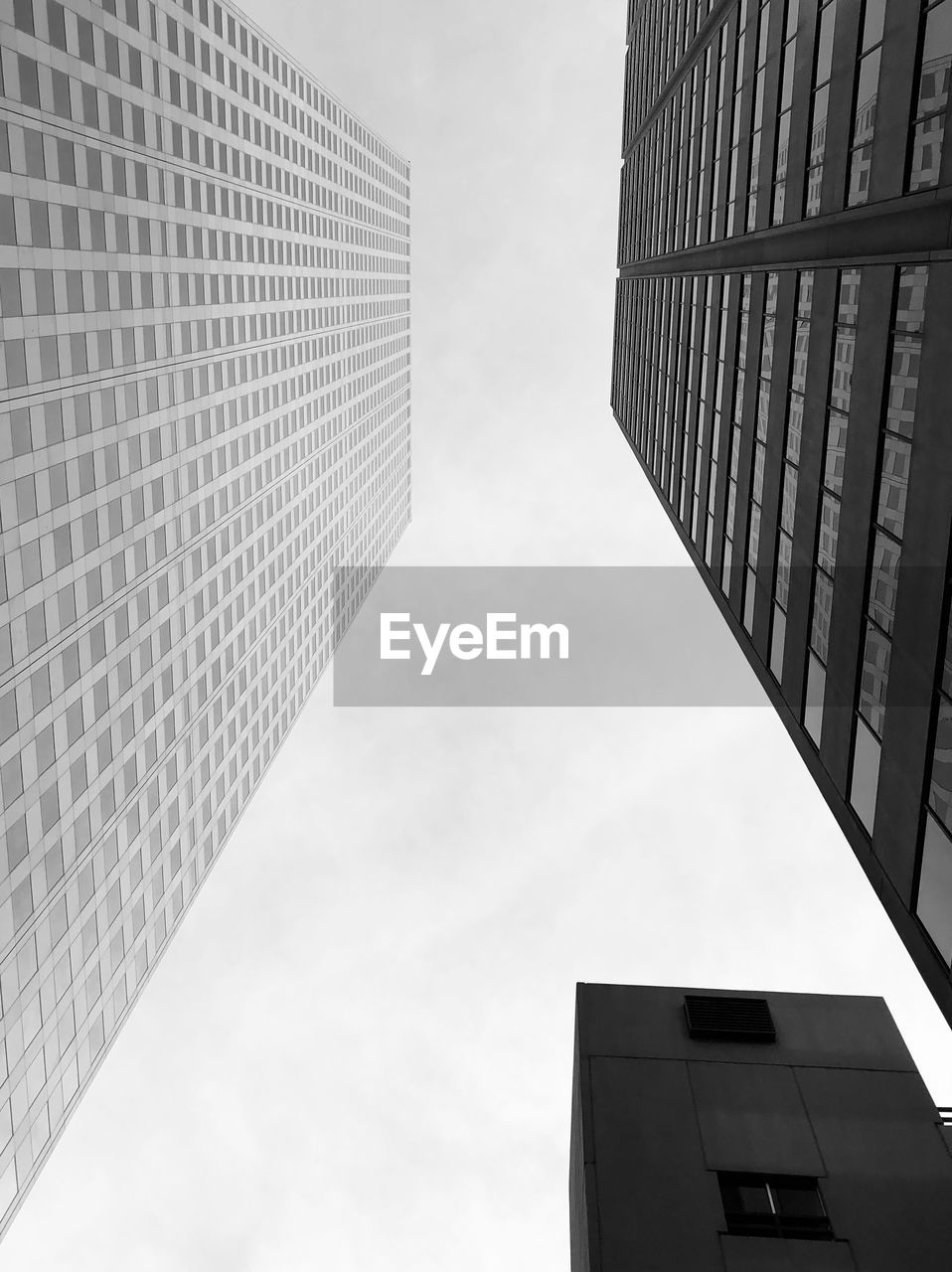 Low angle view of modern buildings against sky