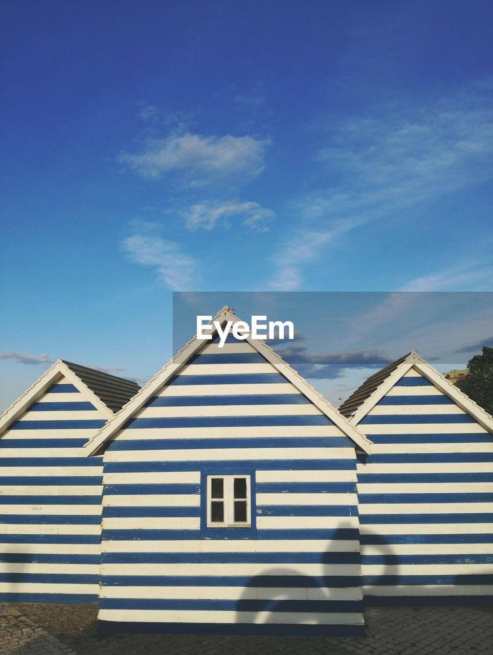 Low angle view of building against blue sky