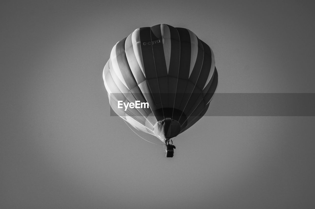 Low angle view of hot air balloon flying in sky