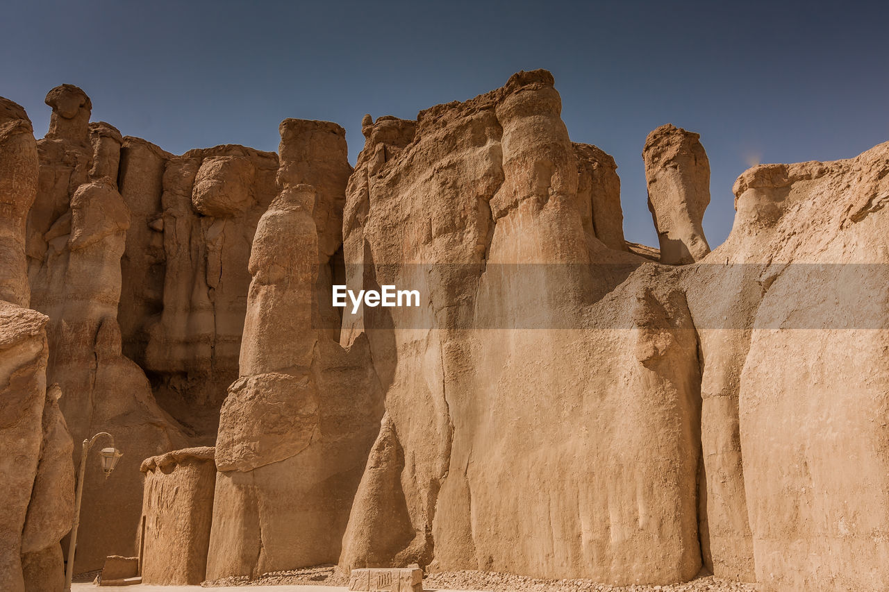 Sandstone formations around al khobar caves, jebel qarah
