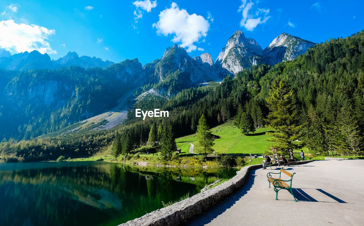 Panoramic shot of countryside lake against mountain range
