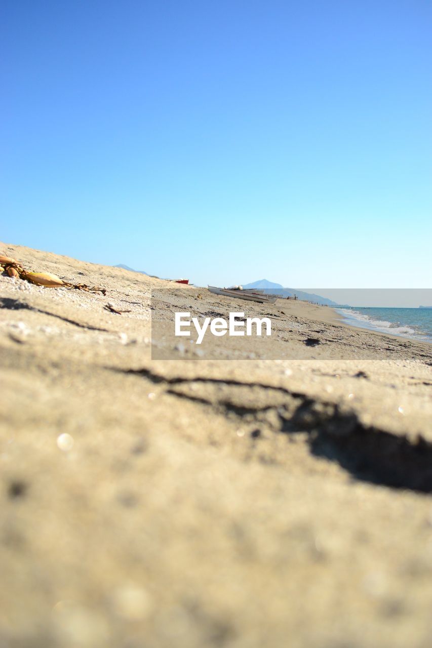 SURFACE LEVEL OF RIVER AGAINST CLEAR BLUE SKY