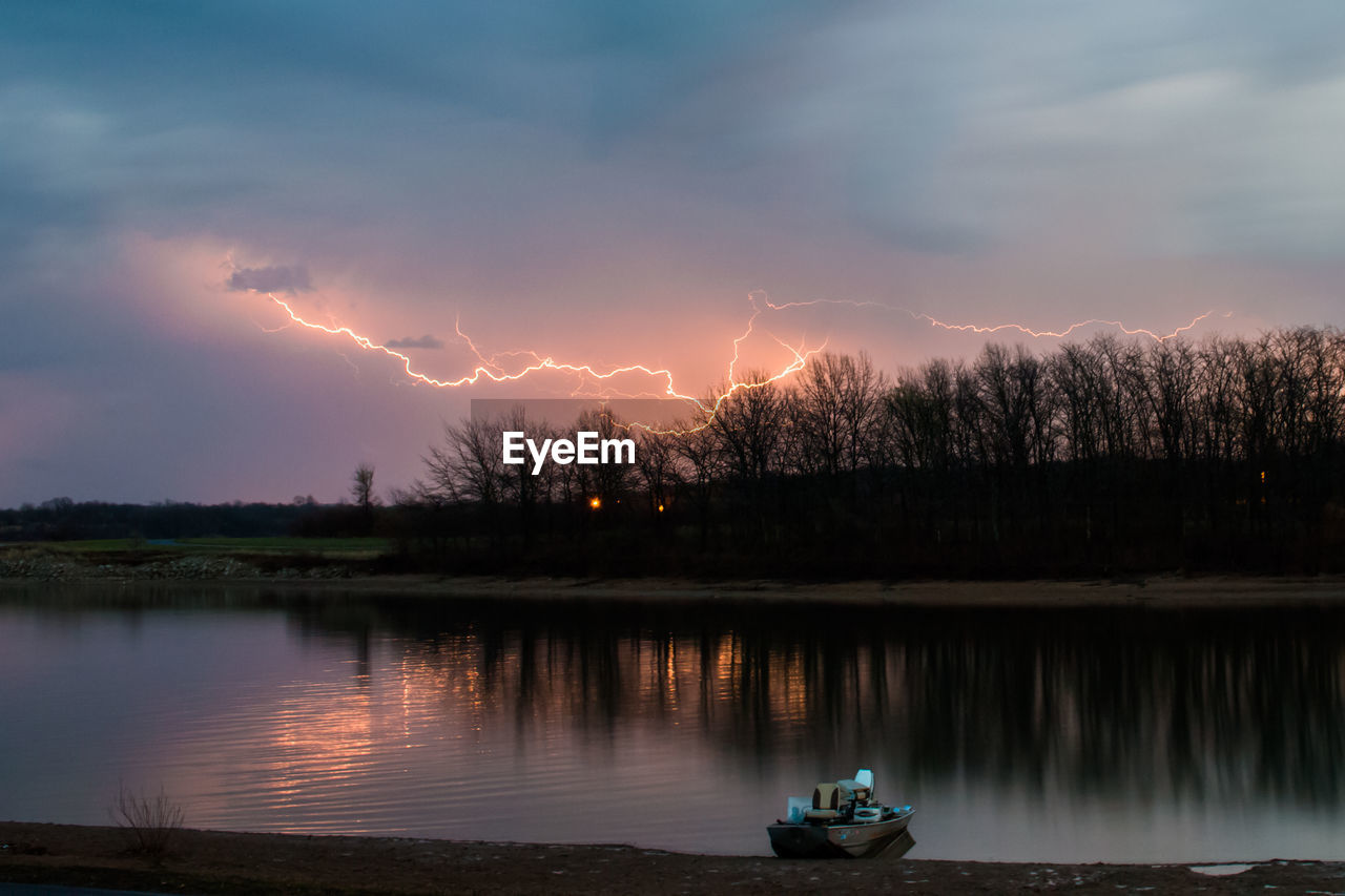 Idyllic view of lightning at lakeside