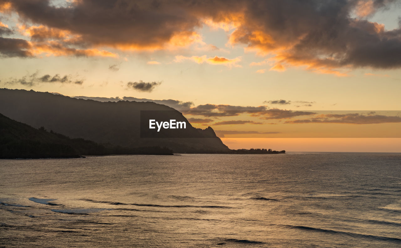 Scenic view of sea against sky during sunset