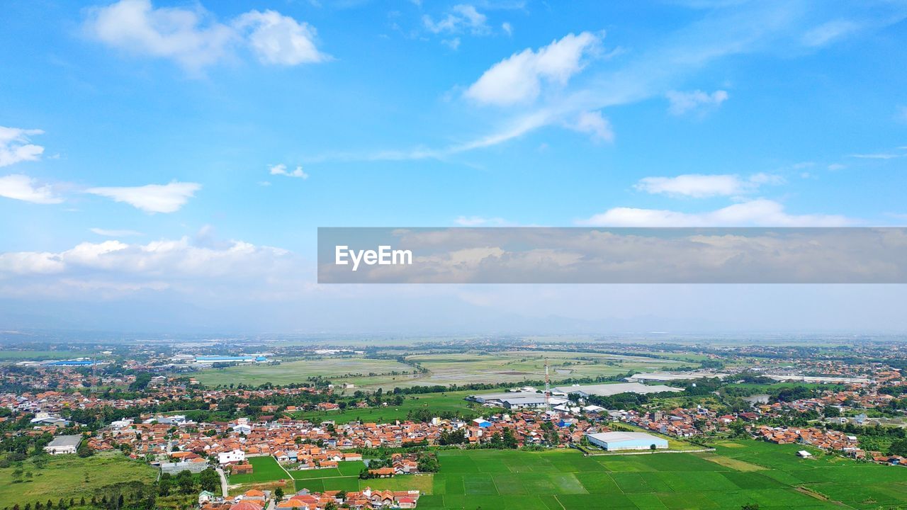 High angle shot of townscape against sky